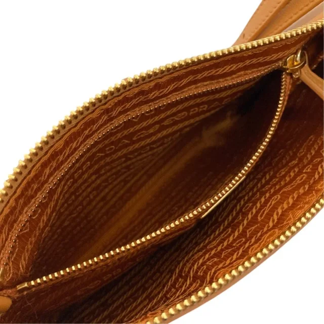 Prada Triangle Plate Soft Grain Leather Shoulder Bag in Brown Leather from LuxUness, photo 13 of 16