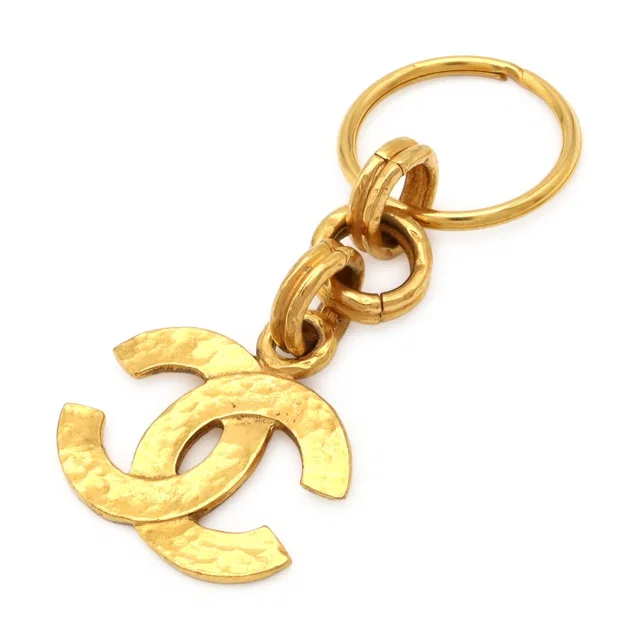 Chanel CC Logo CC Mark Key Holder Key Sling Bag Charm Gold Plated in Gold from The Reluxe