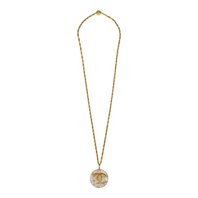 Chanel Opalescent CC Logo Pendant Necklace in Woven leather from Clotheshorse Anonymous