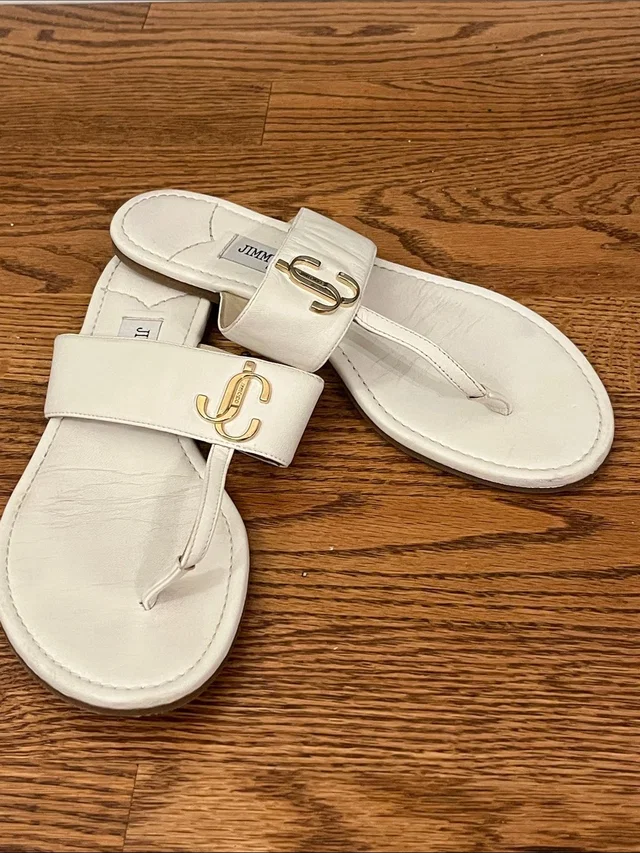 Jimmy Choo Jc Monogram Flat Leather Thong Sandals In White/Milk Leather in gold|white Leather from Poshmark