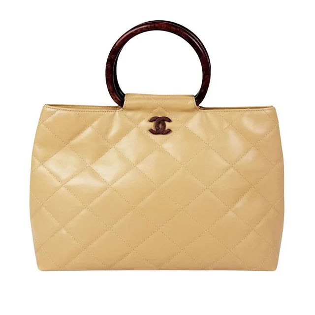 Chanel Handbag Beige in Beige Leather from The Reluxe