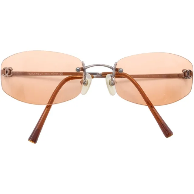 Chanel CC Logo Rimless Sunglasses Eyewear Model Orange in Orange from The Reluxe