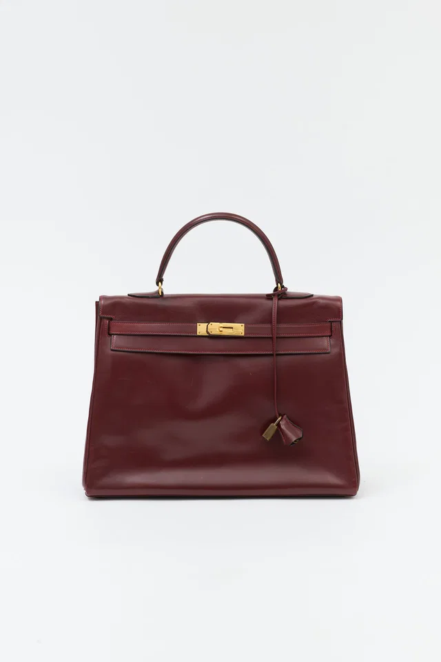 Hermès 1975 Rouge H Box Kelly Retourne 35 Bag in Burgundy Box leather from VSP Consignment