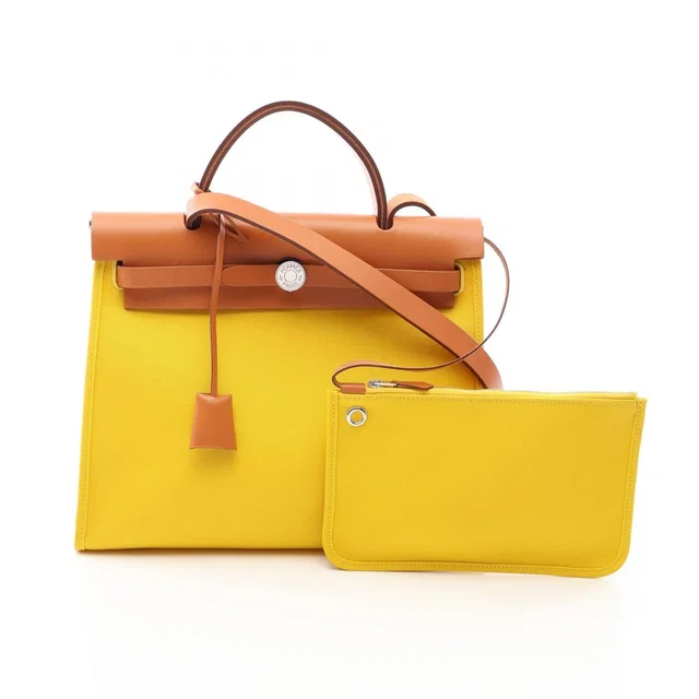 Hermès Handbag Herbag Zip PM 2-Way Jaune Naple Natural Canvas Leather in Beige Canvas from The Reluxe