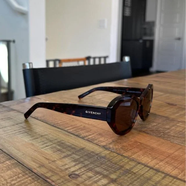 Givenchy Women's Sunglasses - Brown/Black in black|brown|red from Depop, photo 1 of 1