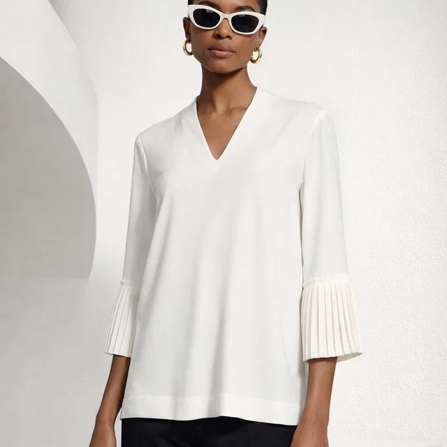Escada Cream V-Neck Pleated Cuff Blouse in white from Poshmark