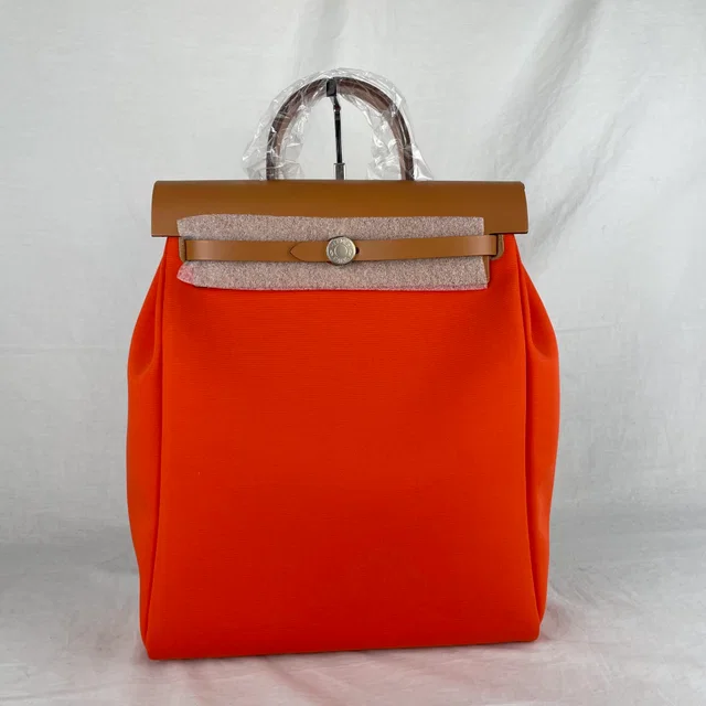 Hermès Herbag Zip Retourne Tilt Backpack in Hunter Cowhide, Officier canvas from Reowned