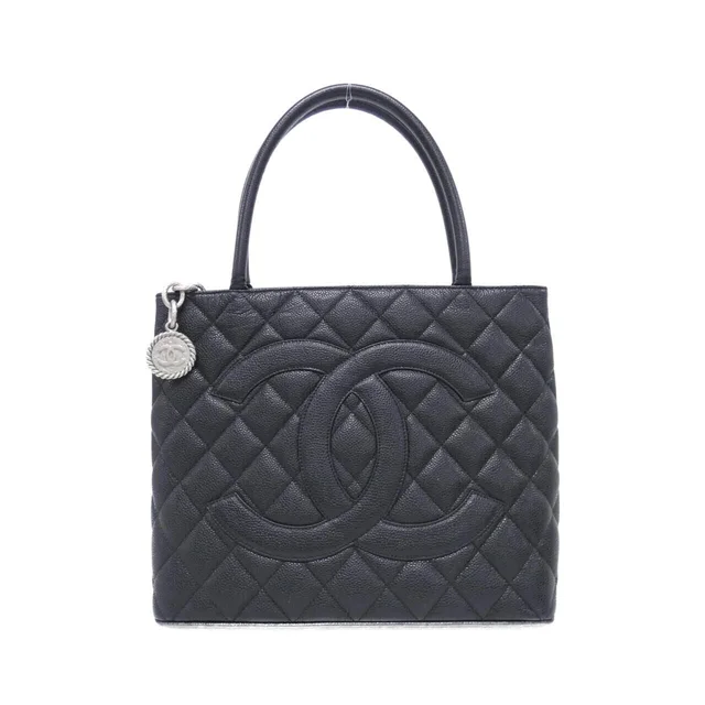 Chanel Bag Handbag Black in Black Caviar leather from The Reluxe