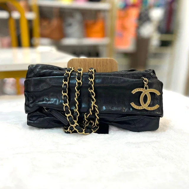 Chanel Black Calfskin Leather Paris Bombay Midnight Swim Baluchon Bag In GHW in Black Calfskin from Luxury Promise