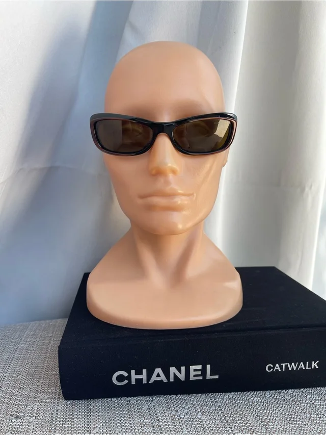 Chanel sunglasses in black|red from Poshmark, photo 1 of 1