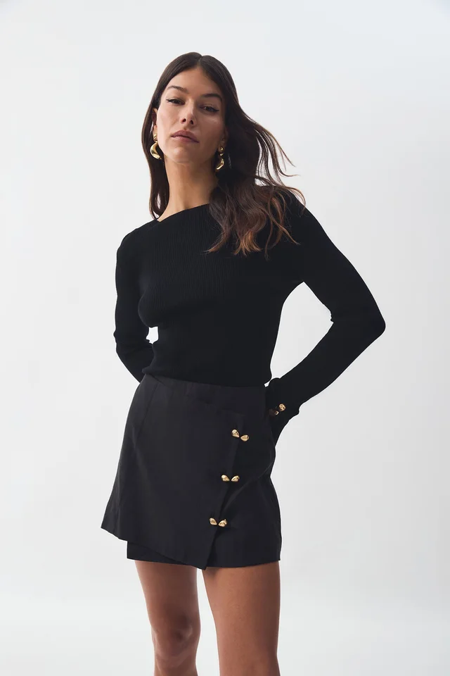 AJE Amber Mini Skirt in Black from Aje, photo 1 of 1