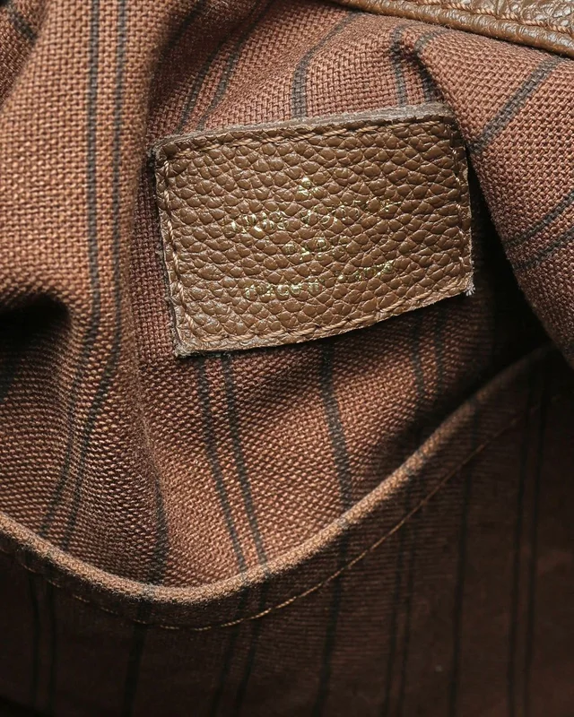 Louis Vuitton Empreinte Artsy MM Bag in Canvas from A Retro Tale, photo 9 of 14