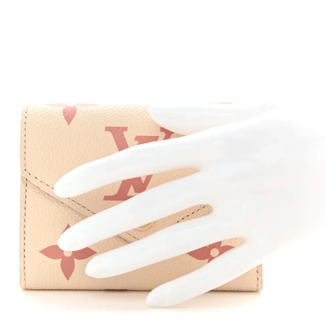 Louis Vuitton Empreinte Monogram Giant Victorine Wallet Creme Bois De Rose in Pink Calfskin from FASHIONPHILE, photo 2 of 8
