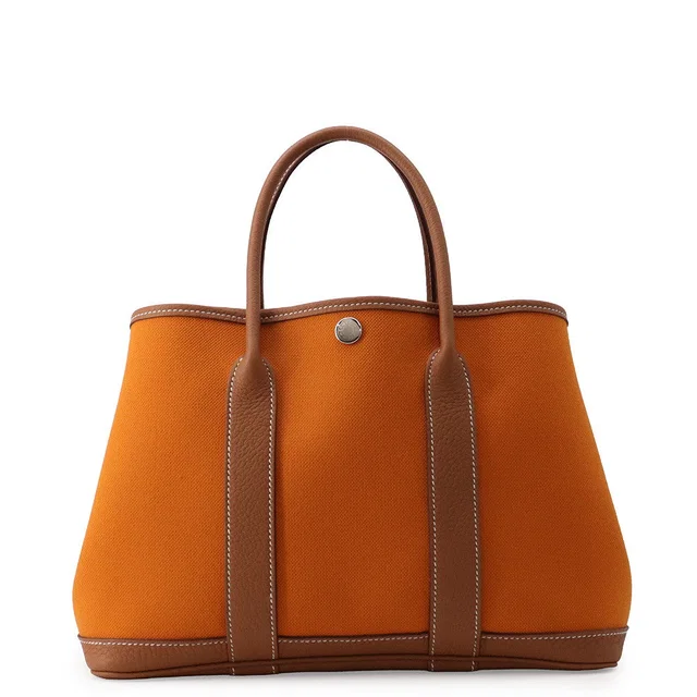 Hermès Garden Party Apricot/Gold Toile Military Negonda Leather Size TPM in Gold Leather from GALLERY RARE