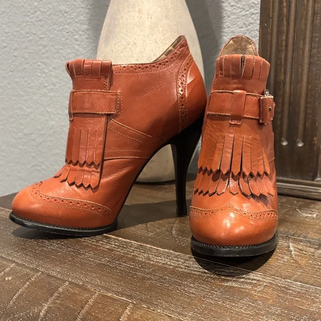 Alexander McQueen Leather Heeled Booties in orange Leather from Poshmark