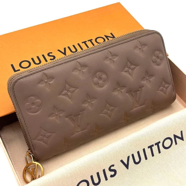 Louis Vuitton Cousin Zippy Wallet Zip Around Beige in Beige Lambskin from The Reluxe
