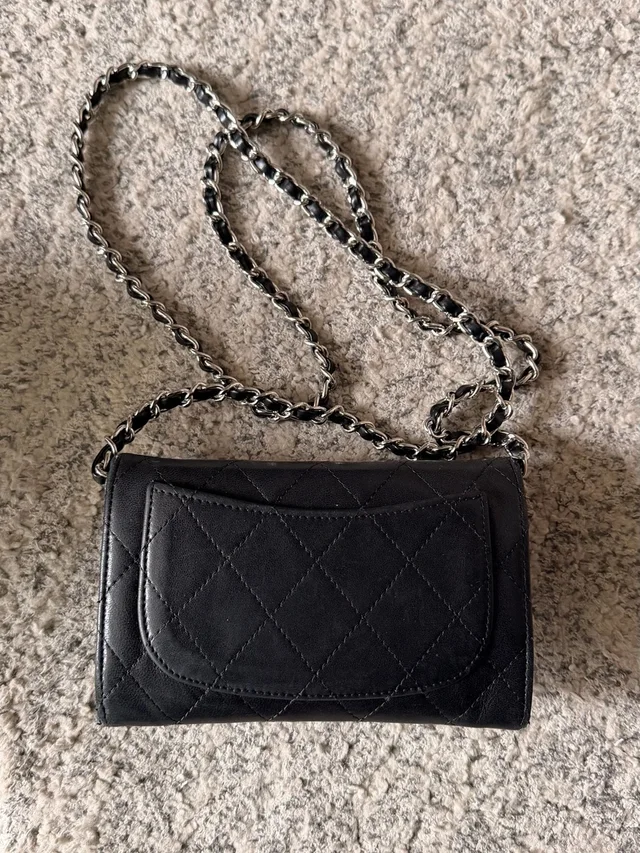 Chanel Quilted Lambskin Mini Wallet-On-Chain With Silver Hardware in black Lambskin from Poshmark, photo 7 of 15