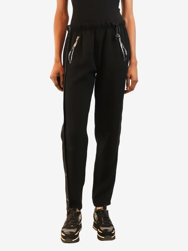 Louis Vuitton Black track pants - size UK 6 in Black from Sign of the Times