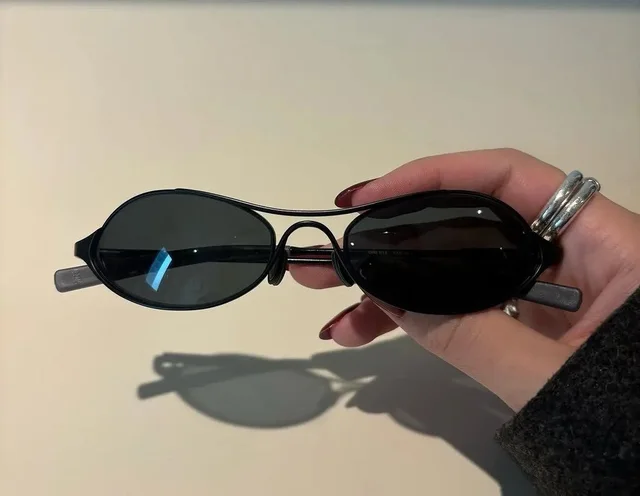 Ss2000 Prada Y2K Vintage Sunglasses in black from Grailed
