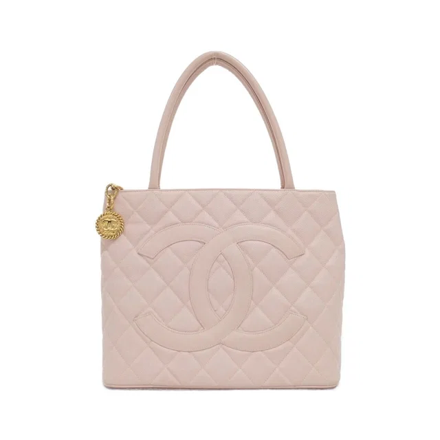Chanel Vintage Bag Handbag Pink in Pink Caviar leather from The Reluxe
