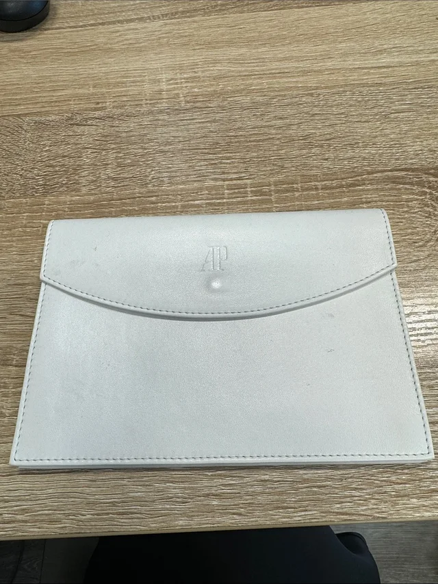 Audemars Piguet Embossed White Leather Envelope Traveling Clutch in white Leather from Poshmark