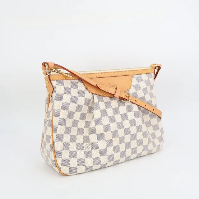 Louis Vuitton Siracusa PM Shoulder Bag in Coated canvas from The Reluxe