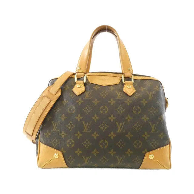 Louis Vuitton Monogram Retiro PM Bag in Coated canvas from The Reluxe