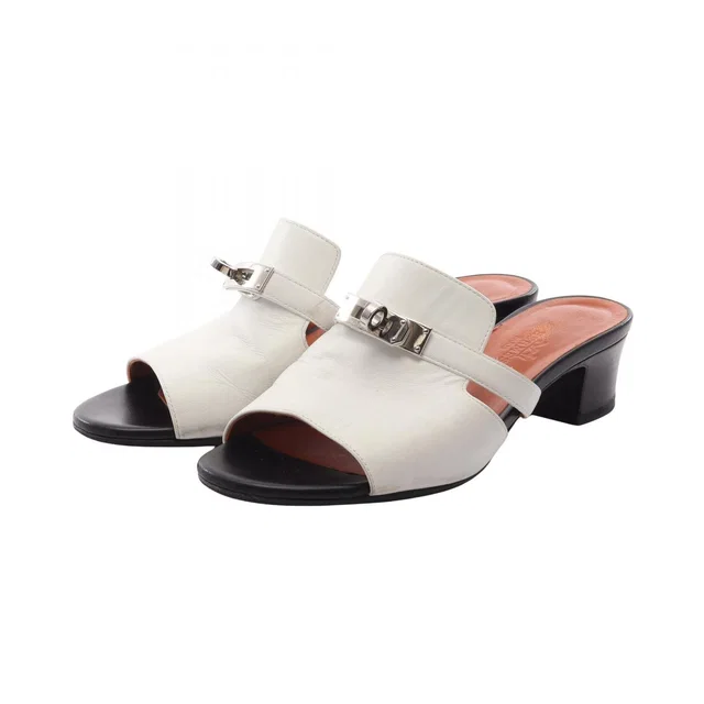 Hermès Mules Candy Leather in Leather from The Reluxe