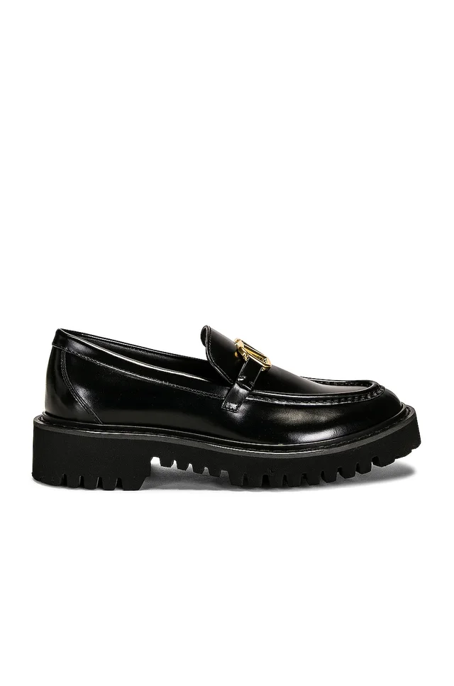 Valentino Garavani Signature V Logo Loafers in Black from FWRD, photo 1 of 1
