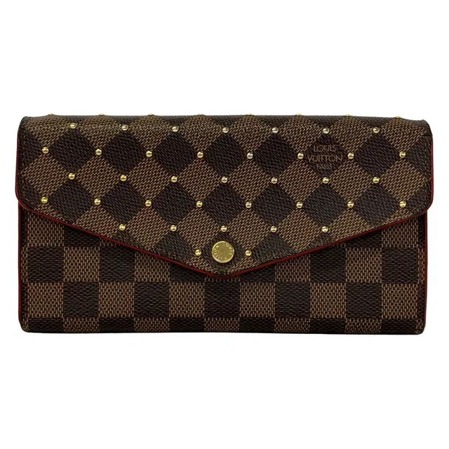 Louis Vuitton Wallet Damier Studs Portefeuille Sarah Ebene Rouge Leather in Brown Leather from The Reluxe