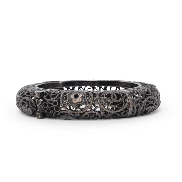 Chanel Blackened Metal Filigree Hinged Bracelet from Blue Spinach
