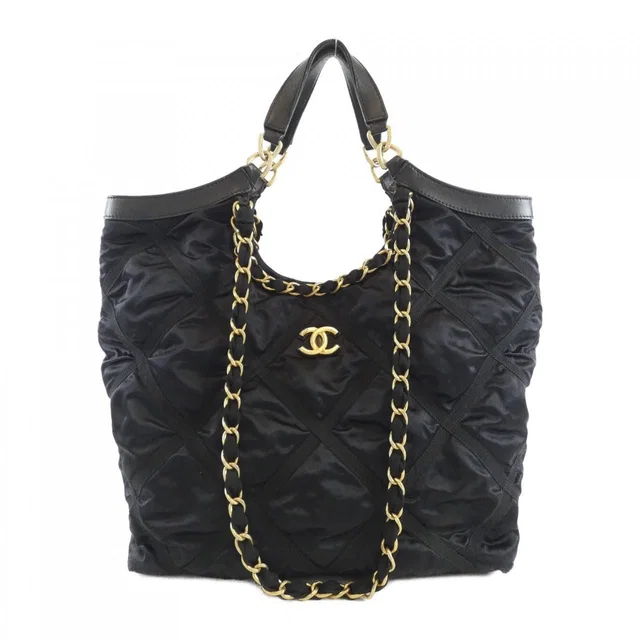 Chanel Bag Handbag Black in Black Nylon from The Reluxe