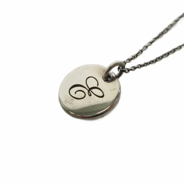 Tiffany & Co. Notes Letter Disc Necklace Silver Colored in Silver from The Reluxe