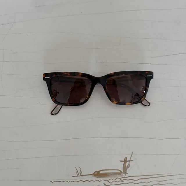 The Row Women's Sunglasses - Brown/Black in brown|black|red from Depop, photo 1 of 1