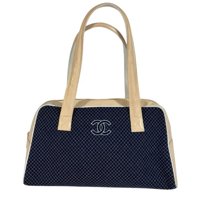 Chanel Shoulder Bag CC Logo Quilted Canvas Navy in Navy Canvas from The Reluxe
