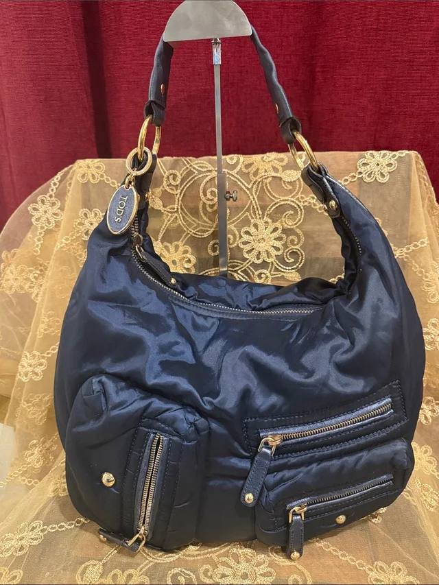 Tod's Navy Quilted Nylon Shoulder Hobo in blue Nylon from Poshmark
