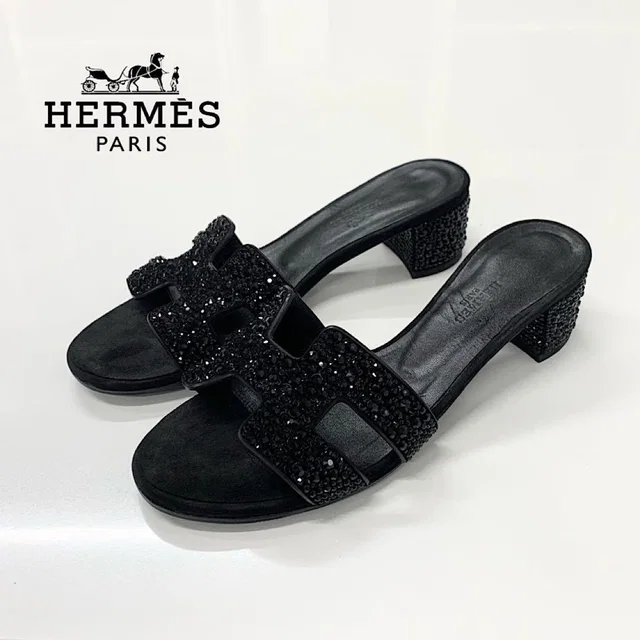 Hermès Oasis Leather Rhinestone Sandals Black in Black Leather from The Reluxe