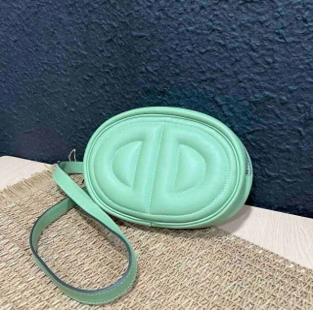 Hermès in the loop waist bag avocado green Y charm in Green from Luxury Promise