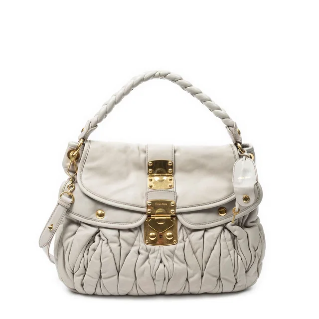 Miu Miu Bo Bag Gray Nappa Matelasse Leather in Grey Nappa leather from The Reluxe