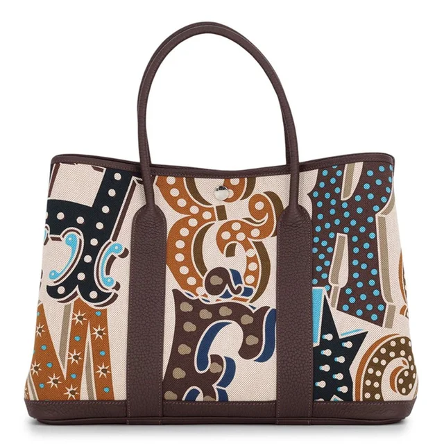Hermès Tote Bag Garden Party PM Electric Ebene Silver Toile H Negonda in Brown from The Reluxe