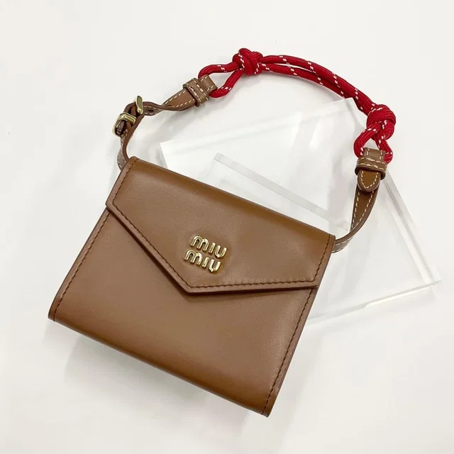 Miu Miu Logo Compact Wallet Shoulder Card Case in Leather from The Reluxe