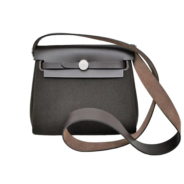 Hermès Herbag Zip 20 Ebene Silver Shoulder Bag Toile Hunter in Brown from The Reluxe