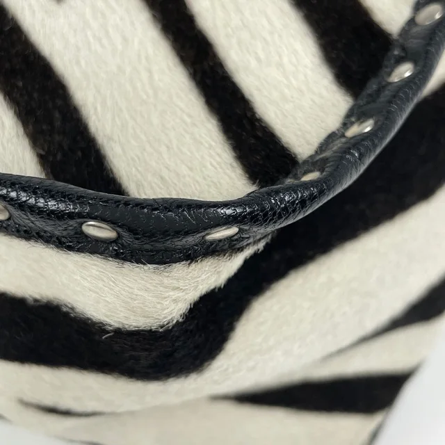 Celine Handbag Boogie Bag Calf Hair White Black in Black Leather from The Reluxe, photo 2 of 2