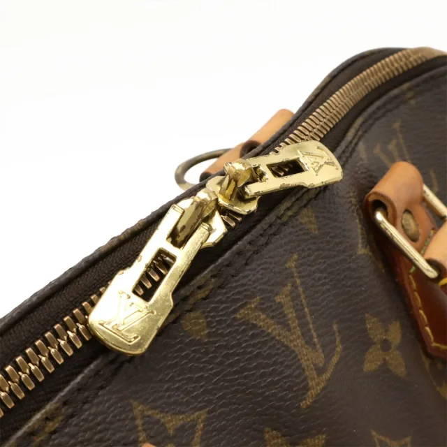 Louis Vuitton Monogram Handbag in Brown Canvas from LuxUness, photo 4 of 9