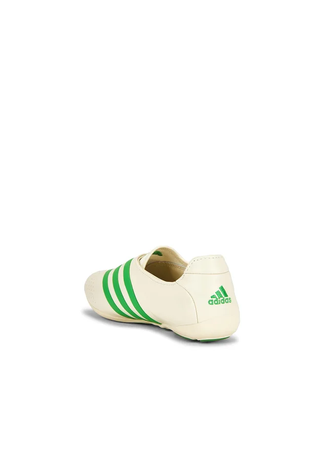 adidas Originals x Pharrell Williams Yoga Vario Sneaker in White & Green, photo 3 of 6 from REVOLVE (Canada)