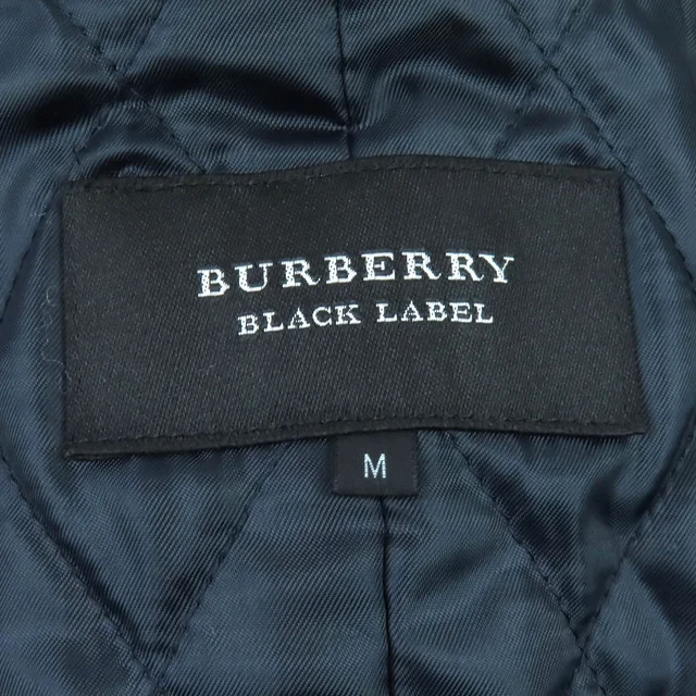 Burberry Black Label Check Pattern Logo Button Wool Coat in Black Wool from LuxUness, photo 2 of 2