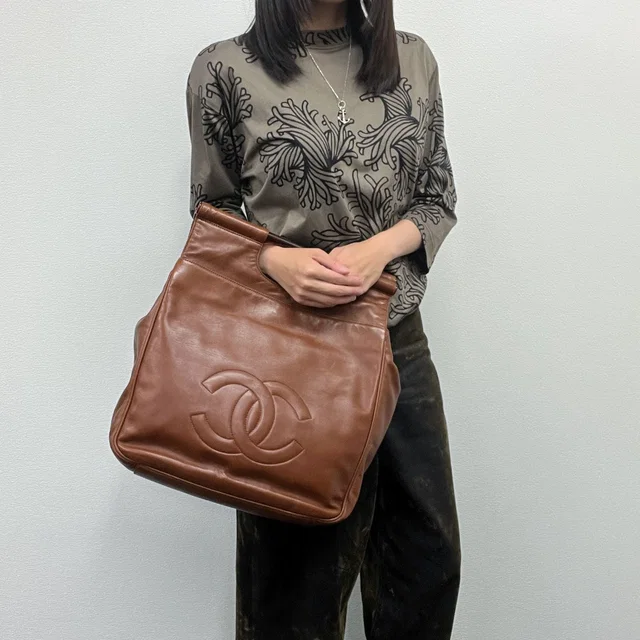 Chanel CC Logo Cutout Handle Handbag Leather Brown Seal Vintage in Brown Leather from The Reluxe