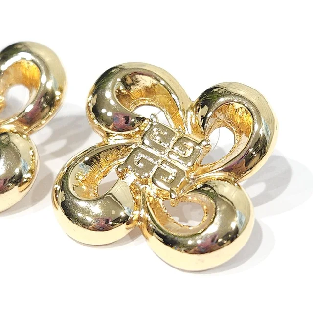 Givenchy Vintage Earrings Logo Icon Bow Post Pierced Gold Tone Chunky in gold from Poshmark