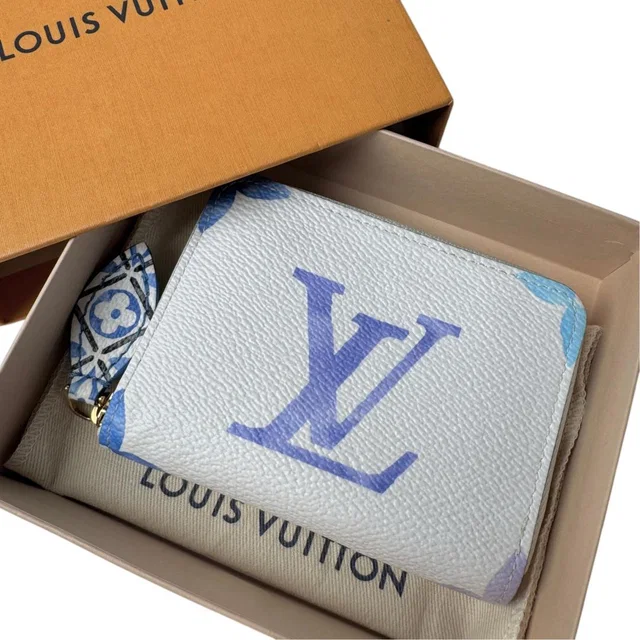Louis Vuitton Zippy Coin Purse by the Pool in Coated canvas from The Reluxe