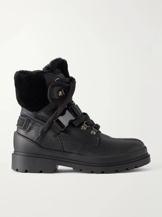 St. Moritz buckled shearling-lined textured-leather ankle boots in Black, image 1 of 1 from NET-A-PORTER (Canada)